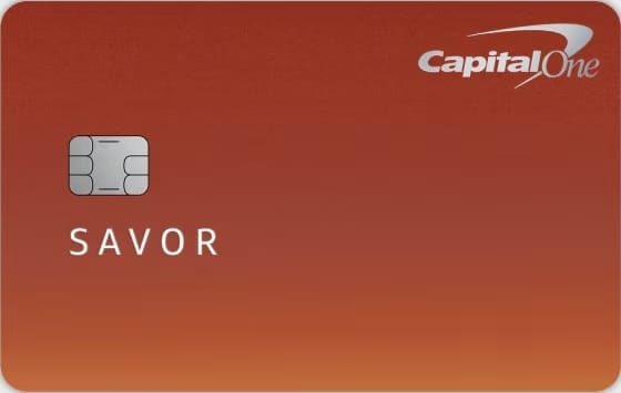 Orange credit card with the Capital One logo in the top right and the word Savor in the middle left.