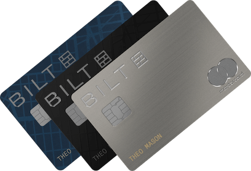 Three credit cards stacked on top of one another at an angle. The top card is silver, the middle card is black, and the bottom card is blue with a pattern. The silver Bilt logo is visible in the top left of each card. The silver Mastercard logo is visible on the bottom right of the top silver card.