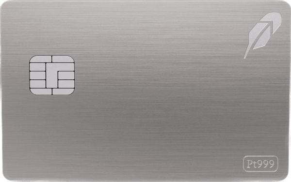 Silver-looking credit card with the Robinhood Feather in the top right, the 99.9% platinum jewelry mark in the lower right, and the EMV chip in the middle of the left side.