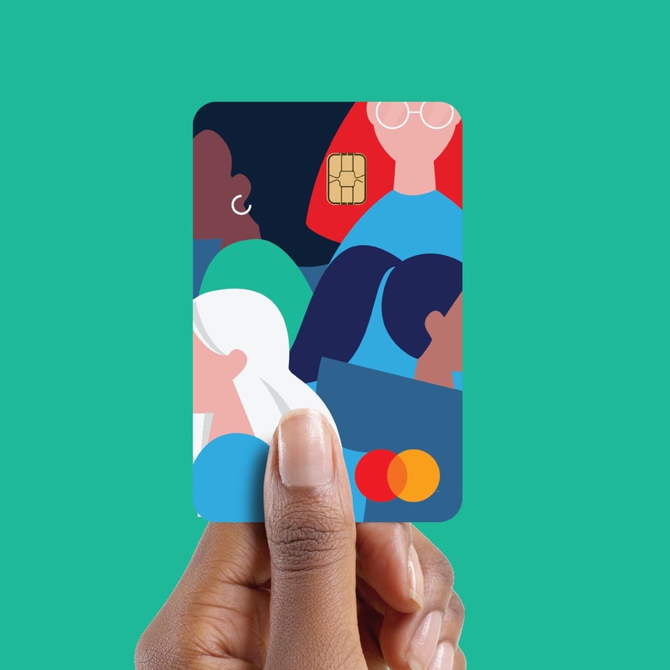 Seneca Women Mastercard in a hand
