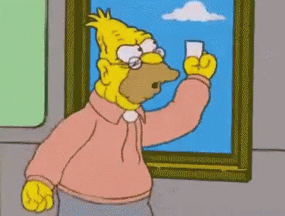 The Simpsons gif. Grandpa Simpson from the Simpsons shakes his hand in a fist, holding a piece of paper, out the window of a building and yells into the sky at a cloud, shouting angrily. 