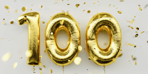 Ballons with "100" and confetti