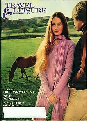 Image of the cover of Travel & Leisure magazine. Image features a woman and man with a horse in the background.