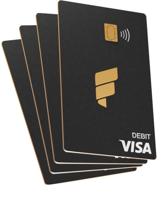 a stack of Fold debit Visa cards