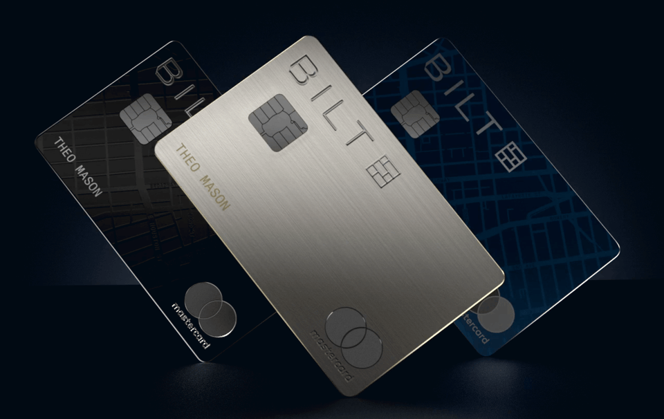 Three Mastercard credit cards, one black, one silver, and one blue. All have the silver Mastercard logo in the bottom right, the Bilt logo in the top left.