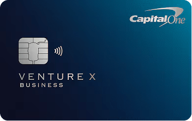 Blue credit card with a silver Capital One bank logo in the top right corner and the words Venture X Business in the middle of the left side.